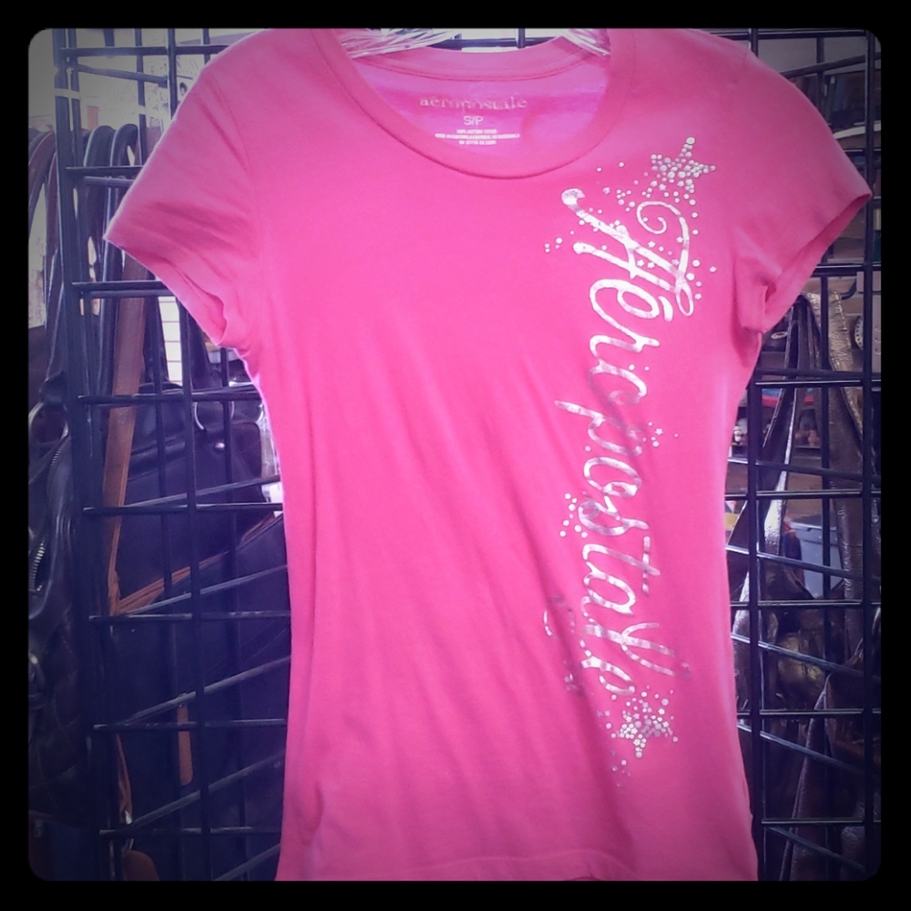 A bundle of 10 mixed shirts for the price of 8